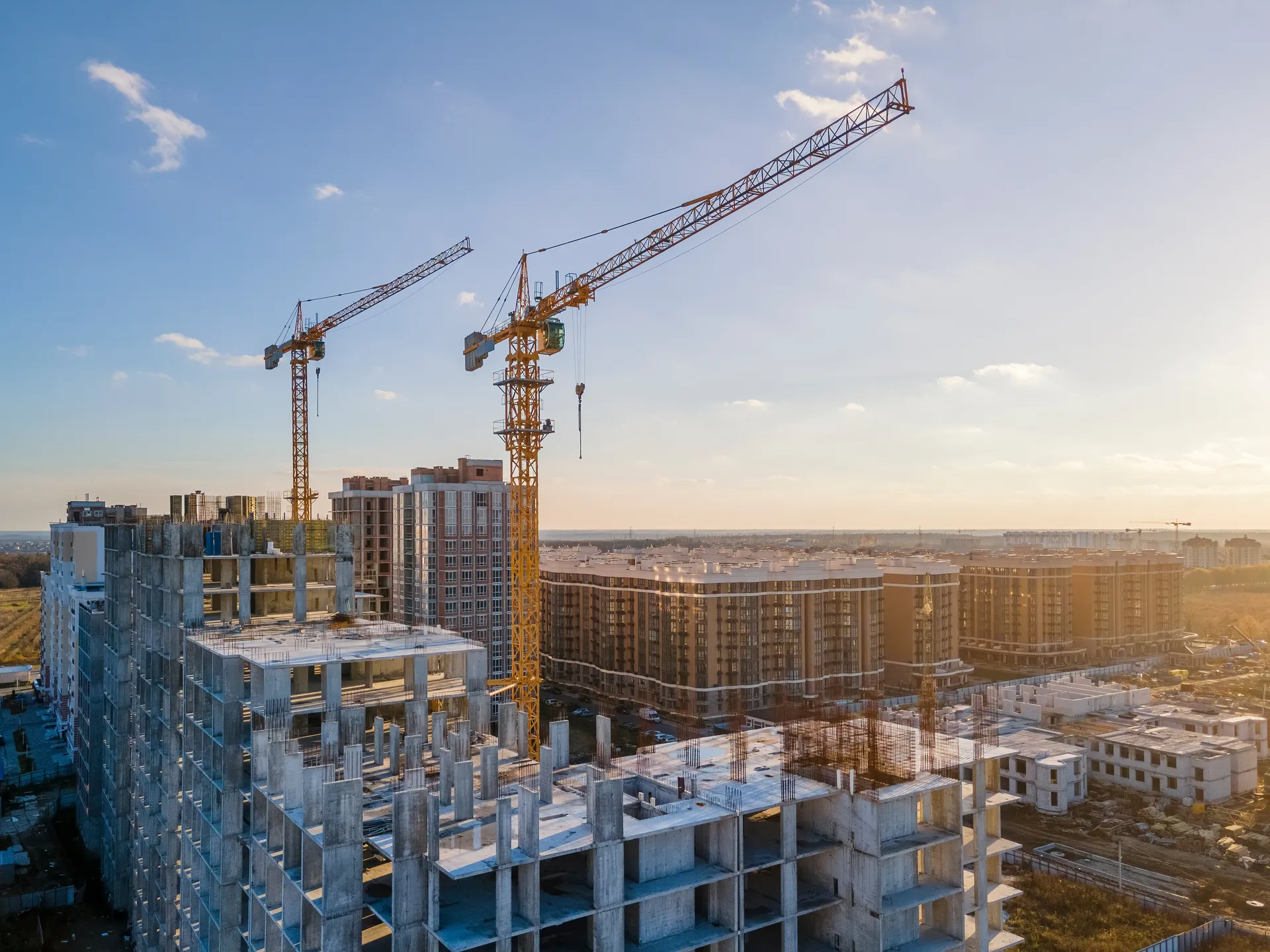 Tower cranes at a residential construction site